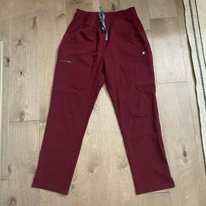 Figs. Womens size medium. High waisted yola skinny scrub pants. Maroon.